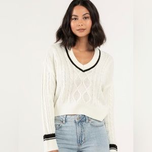 White Tilly’s sweater. Size small. Lightly worn.